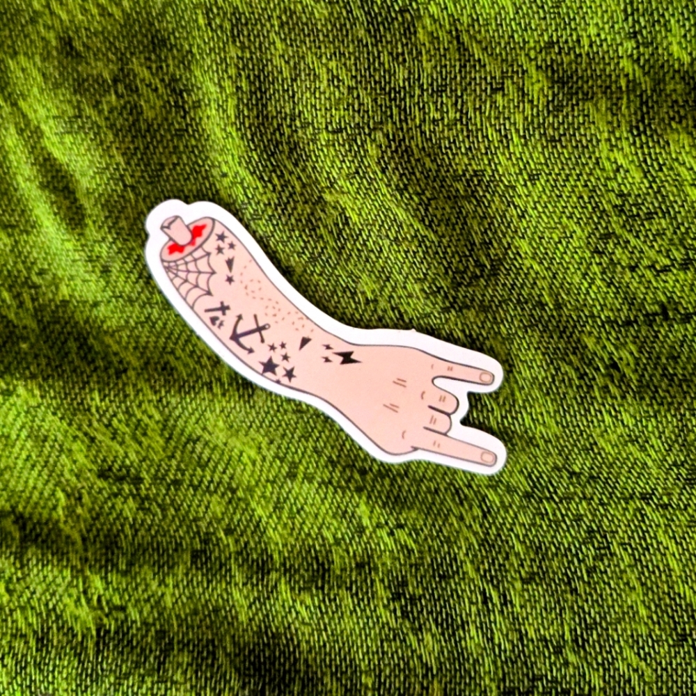 Severed arm sticker